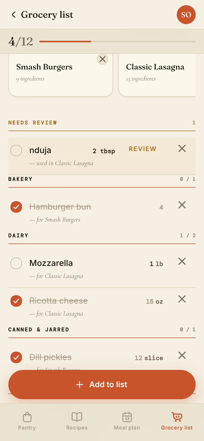 The grocery list on a phone at 4 of 12, with hamburger buns, ricotta, and dill pickles ticked and crossed out, mozzarella still to get, and nduja still under Needs review