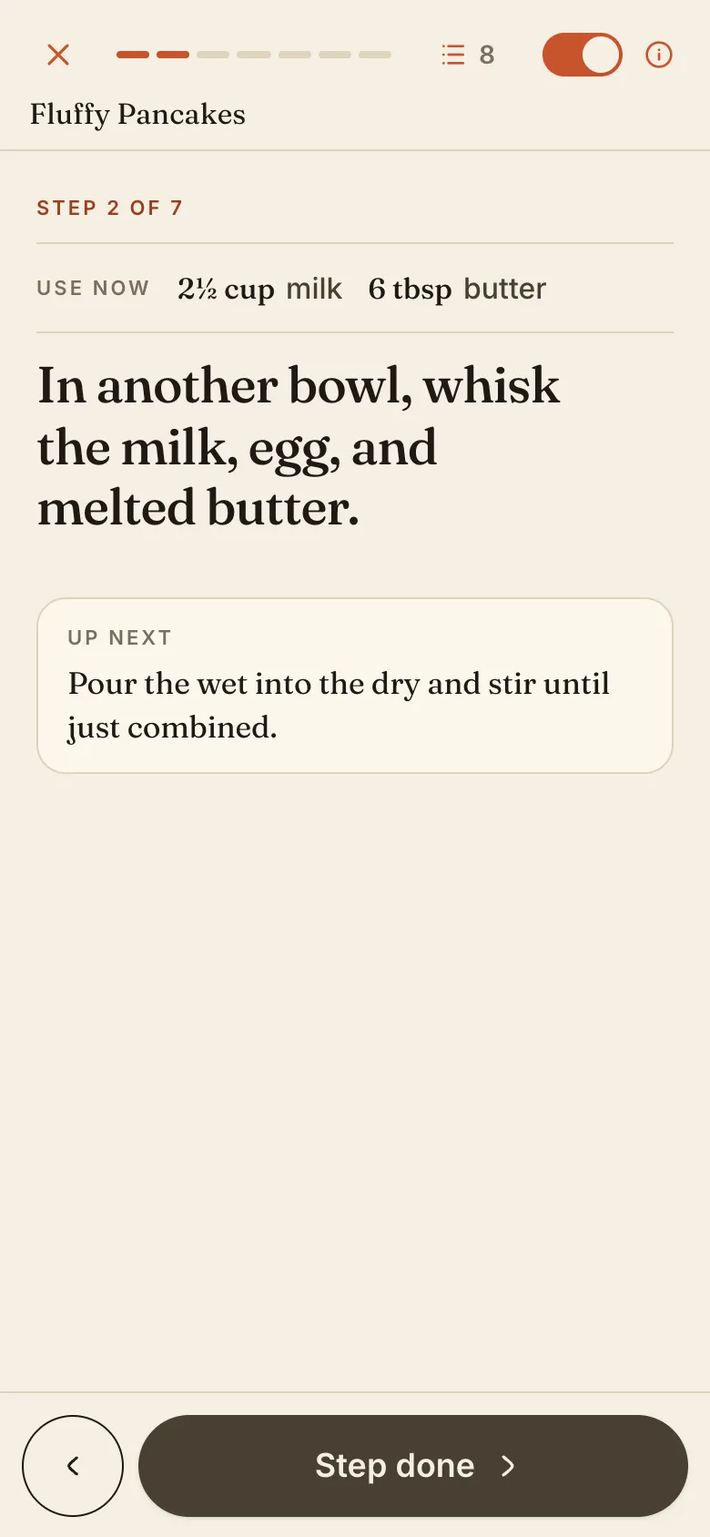 Cook mode step 2 of 7 on a phone, with a Use now strip reading 2½ cup milk and 6 tbsp butter above the step text