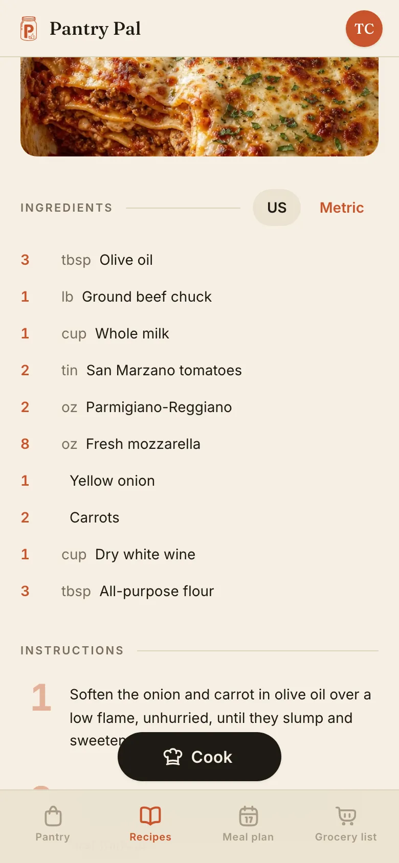 A recipe open on a phone: the bottom of a tray of lasagna, then Ingredients in US units — 3 tbsp olive oil, 1 lb ground beef chuck, 1 cup whole milk, 2 tin San Marzano tomatoes, 2 oz Parmigiano-Reggiano, 8 oz fresh mozzarella, 1 yellow onion, 2 carrots, 1 cup dry white wine, 3 tbsp all-purpose flour — and the first instruction beneath, with a Cook button floating over it.